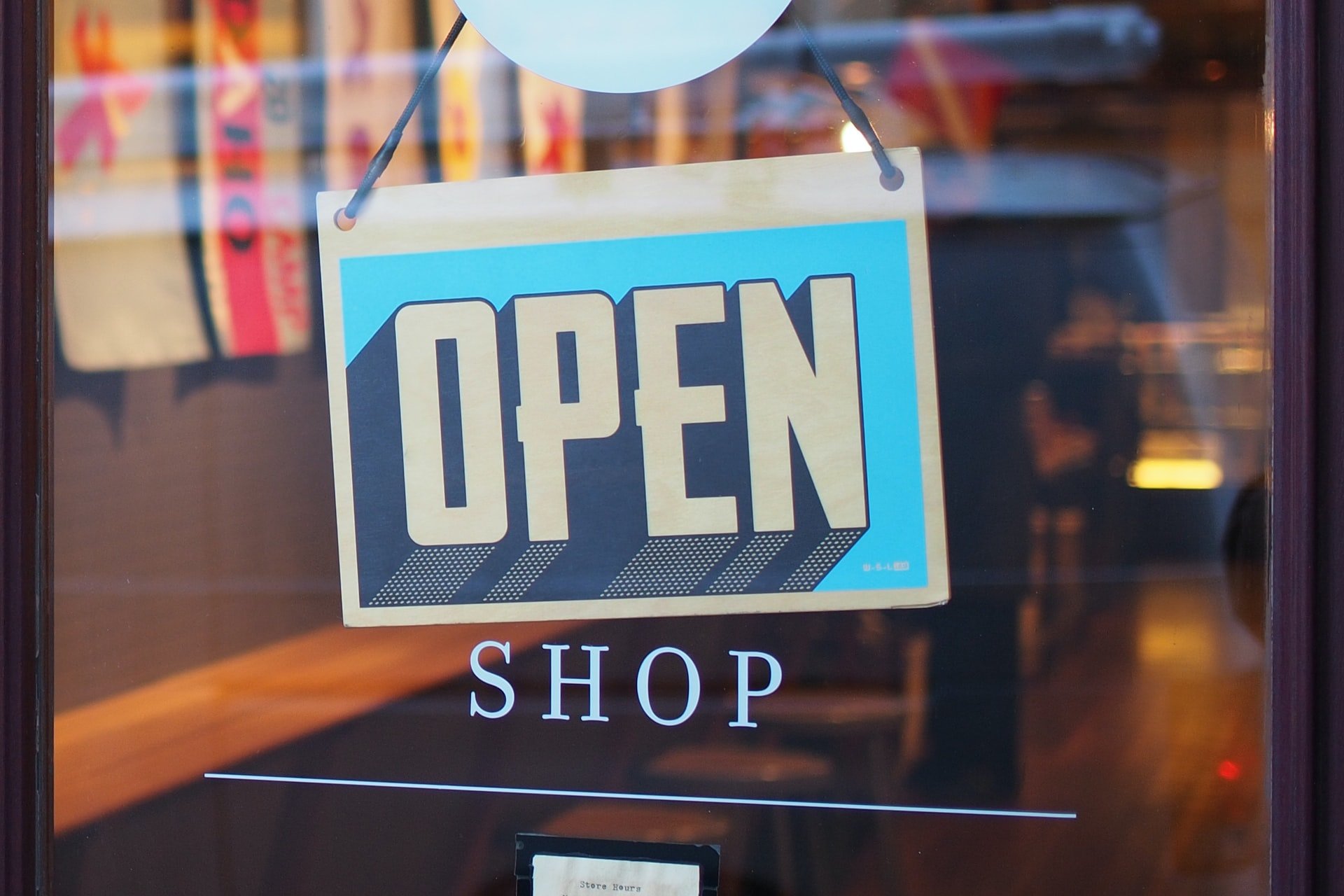 A shop sign that reads 'open'